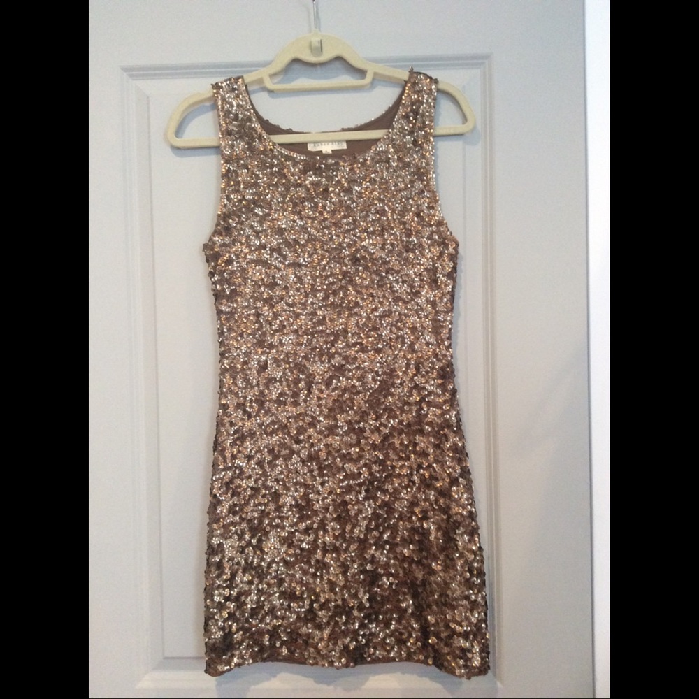 Gold sequin mini dress. Statement piece!